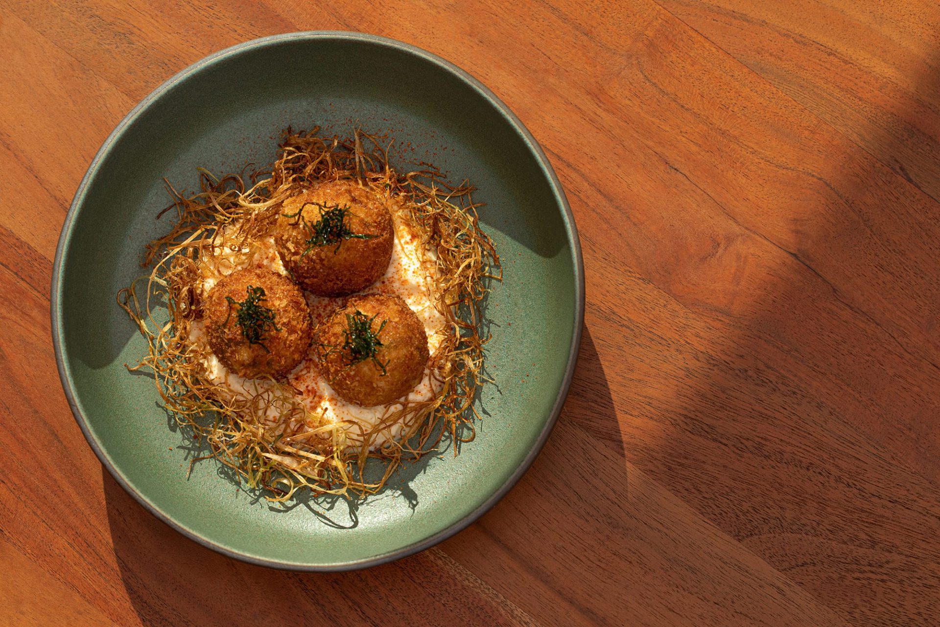 overhead view of nuri grill crab fritters