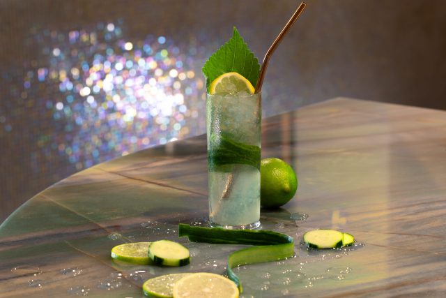 nuris french garden cocktail with fresh lime and cucumber
