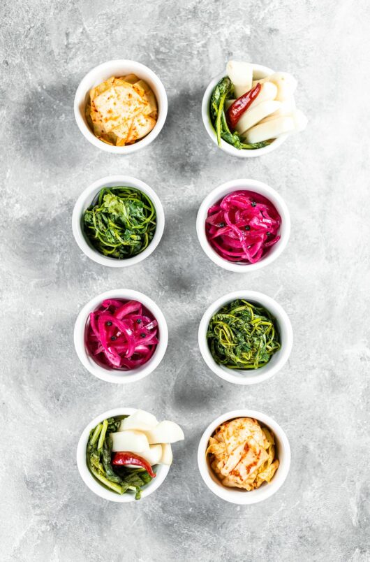 overhead view of korean barbecue side dishes