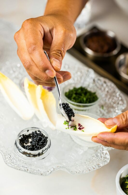 customer scooping imperial caviar